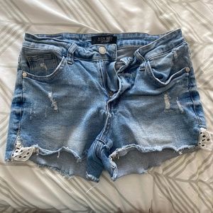 Denim shorts with lace detail